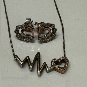 Rose and white gold, with diamonds heartbeat necklace with matching earrings.